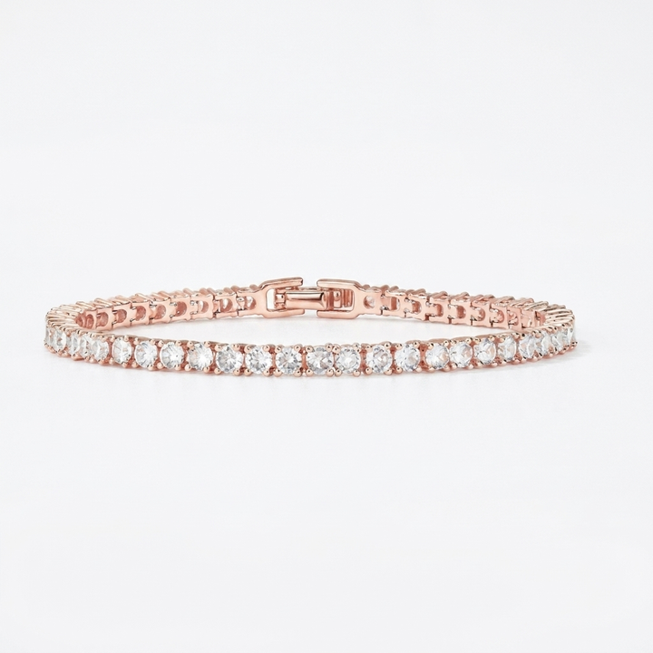 Elegant unisex gold single row tennis bracelet, a minimalist sparkling fashion accessory for everyday wear or special gifts.