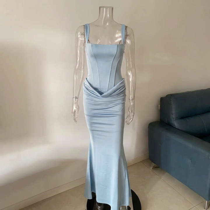 Minimalist women's strapless long slip dress, versatile for elegant summer events & formal occasions.