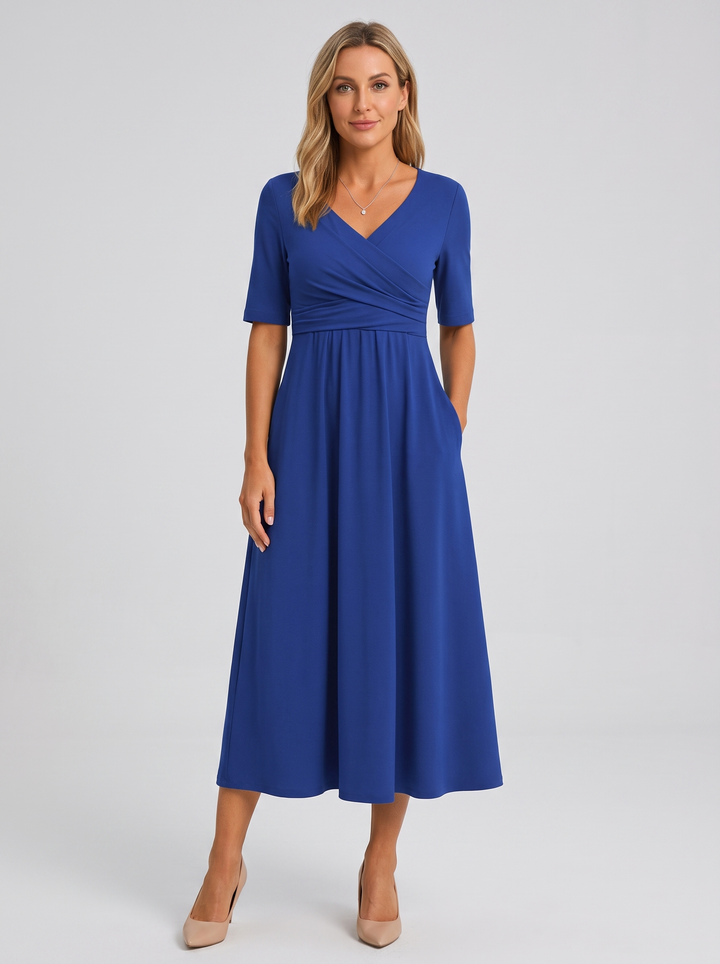 Elegant women's V-neck maxi dress with a flattering wrap style, perfect for versatile wear.