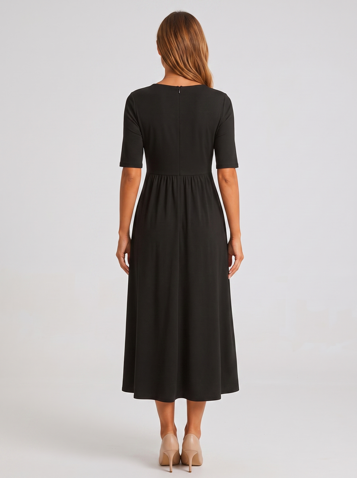 Women's elegant V-neck maxi dress with short sleeves and a flattering wrap design.