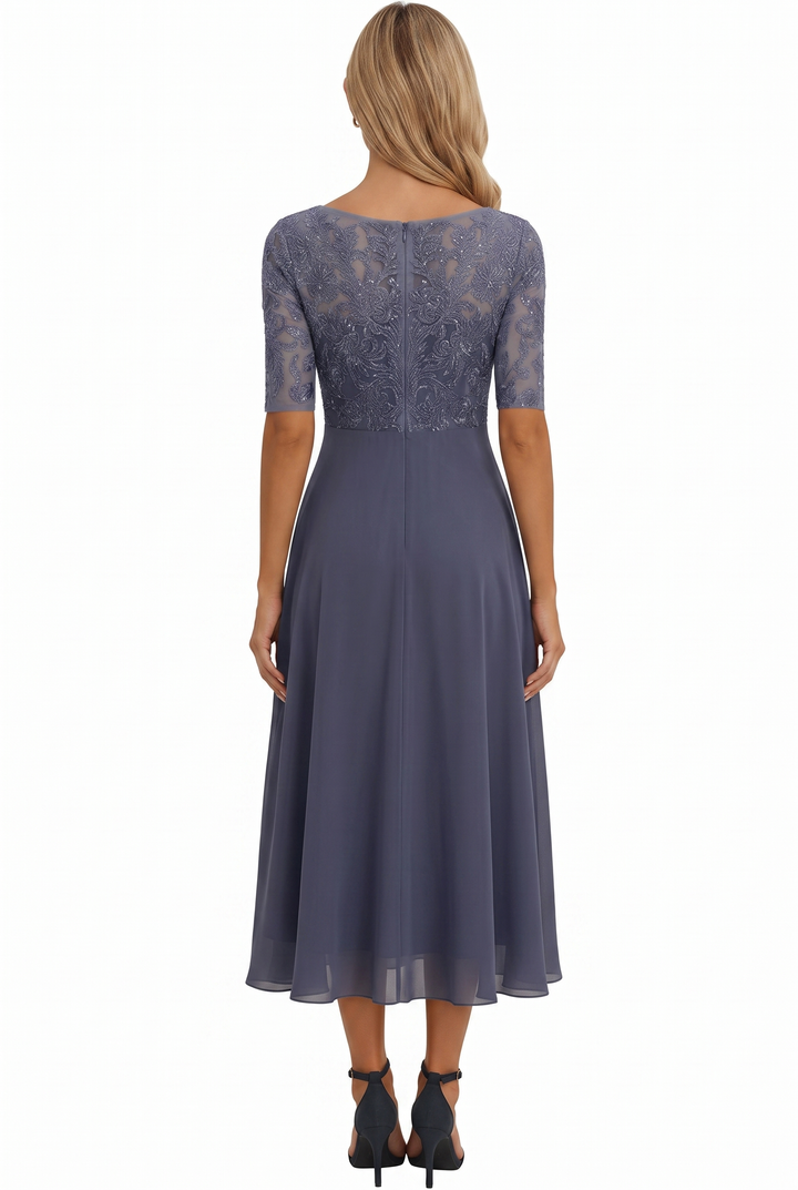 Stylish women's A-line midi dress with three-quarter sleeves, suitable for wedding guests.