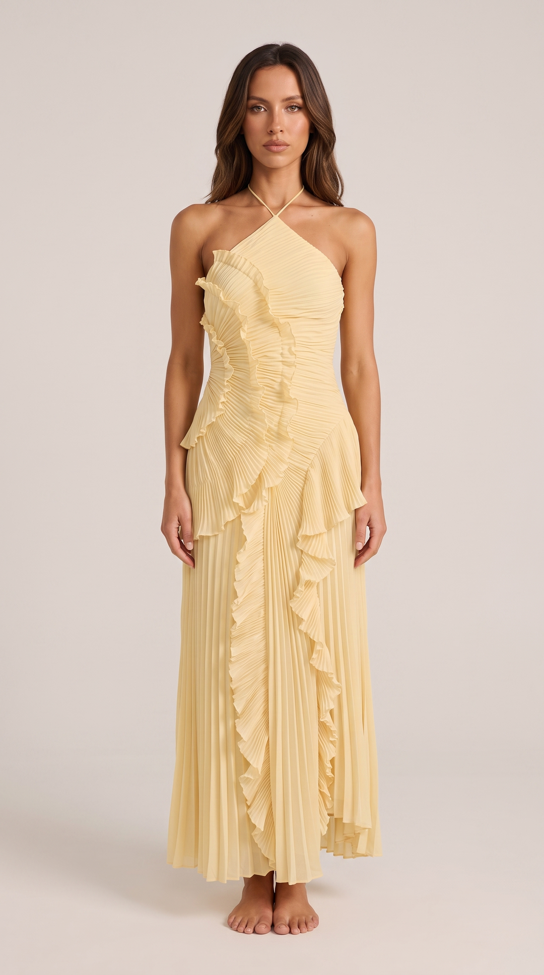 Elegant women's halterneck maxi dress with flowy ruffle and chic asymmetric hem, perfect for summer parties.