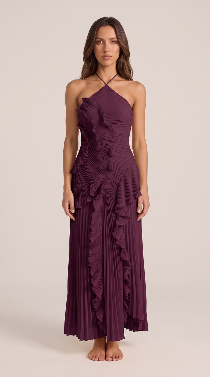 Chic women's halterneck evening dress; long, sleeveless design with an elegant ruffle and asymmetric maxi hem.