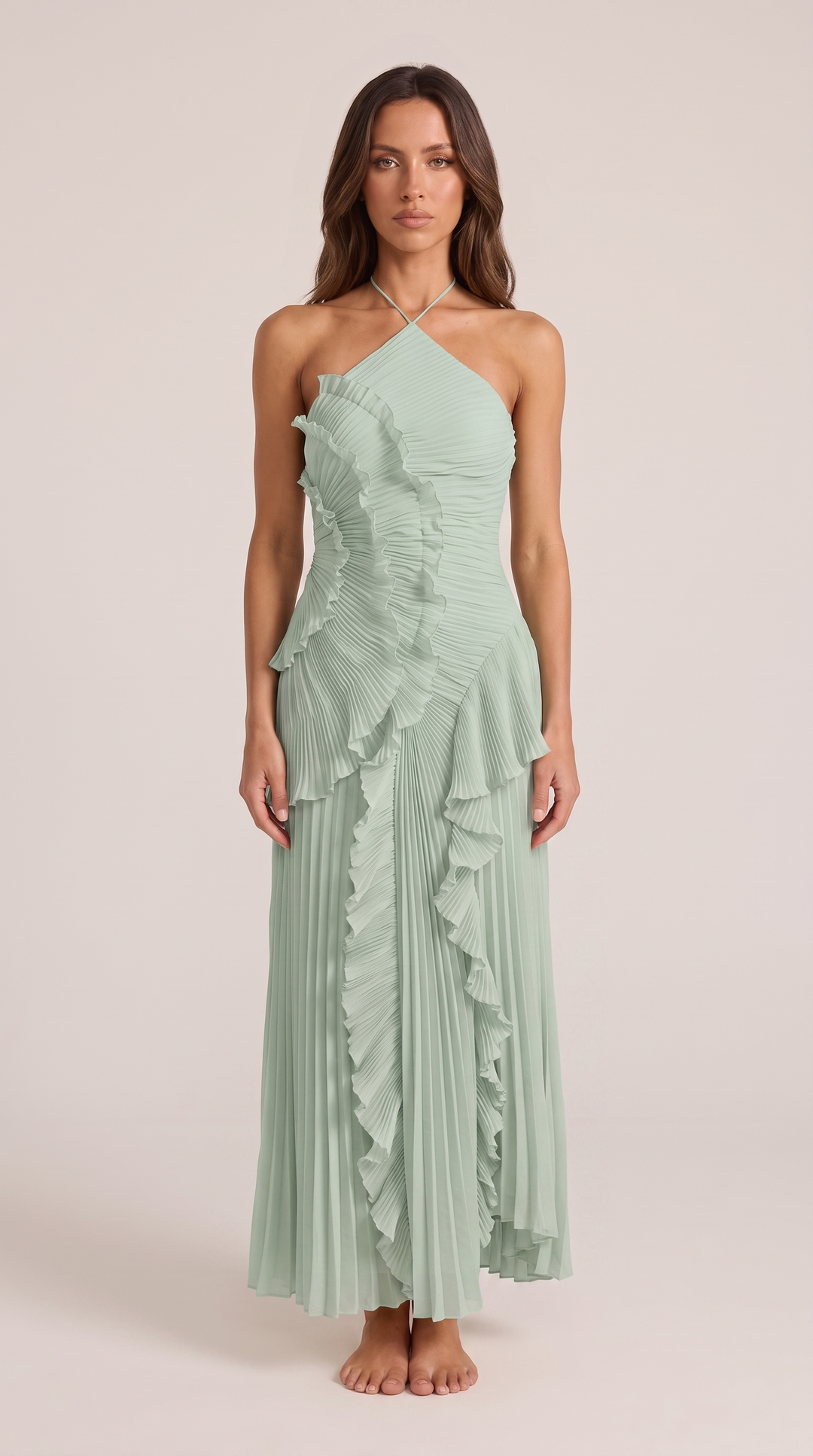 Sophisticated women's summer maxi dress with a flattering halterneck, exquisite ruffles, and modern asymmetric hem.