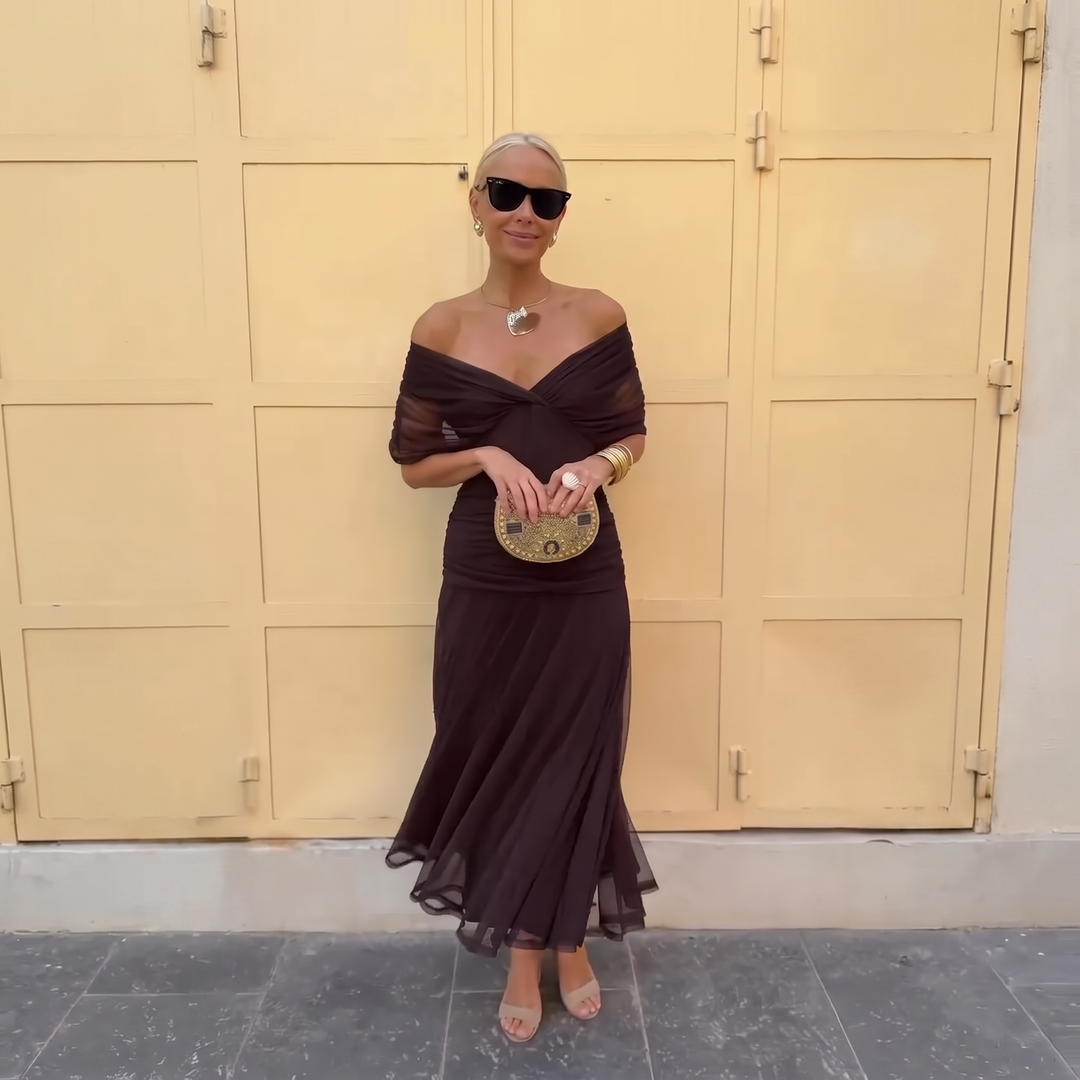 Stunning off-shoulder maxi gown, perfect women's fashion for formal evening events.
