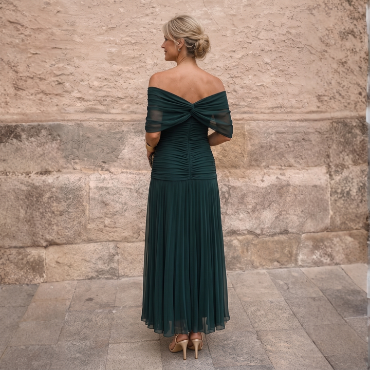Women's formal off-shoulder maxi dress, ideal for wedding guests & special occasions.