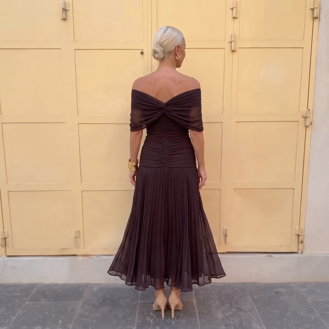 Elegant off-shoulder long dress, a sophisticated formal gown for special occasions.