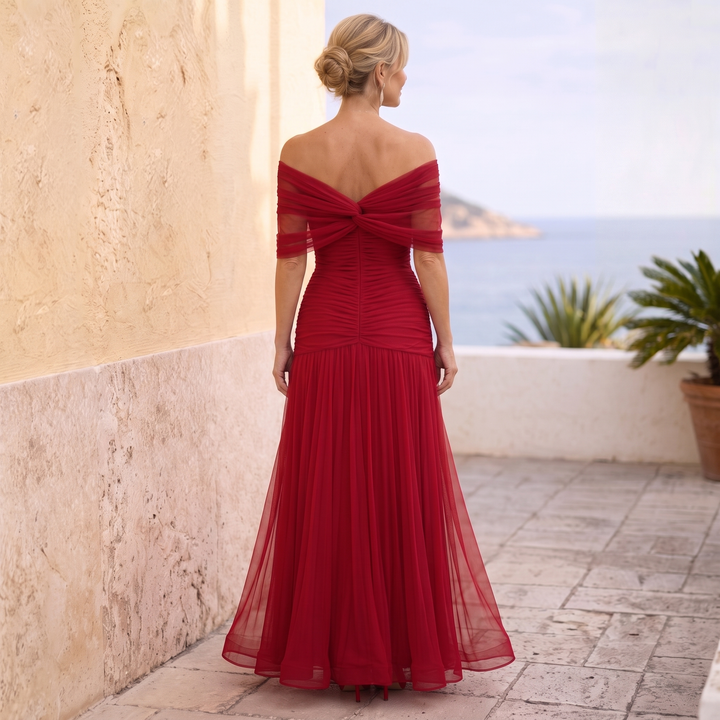 Women's off-shoulder elegant dress, a long formal choice for special evening occasions.