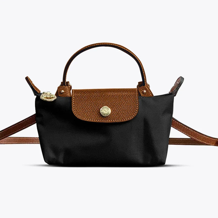Chic women's crossbody bag with adjustable strap, available in blue, black, beige, khaki & pink. Fashionable accessory.
