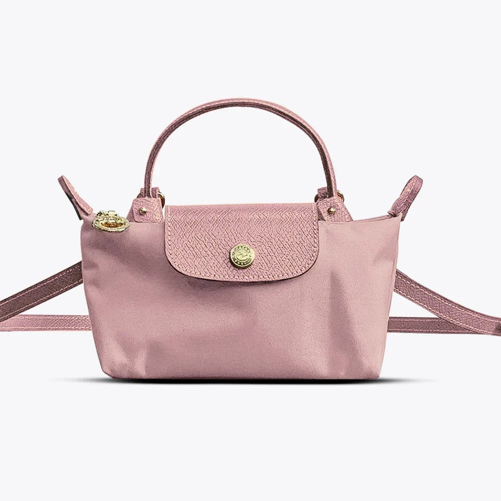 Elegant women's crossbody bag with an adjustable strap, a versatile accessory for any outfit. Perfect ladies handbag.