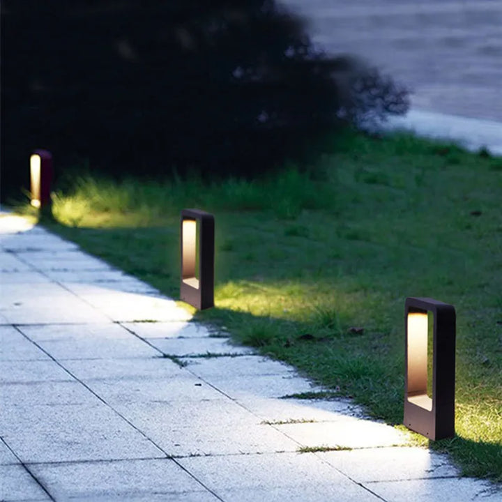 Durable outdoor garden lamp, elegant LED pathway light for modern landscape. Waterproof exterior yard lighting.