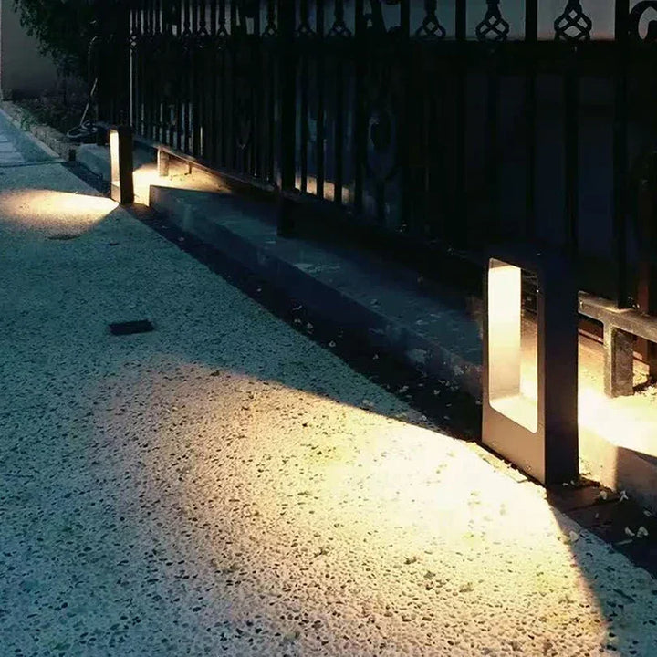 Stylish outdoor garden lamp, a durable pathway light. Modern LED exterior lighting for elegant landscape design.