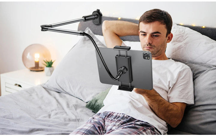 Universal adjustable clip for phones & tablets, perfect for hands-free viewing on any desk or surface.