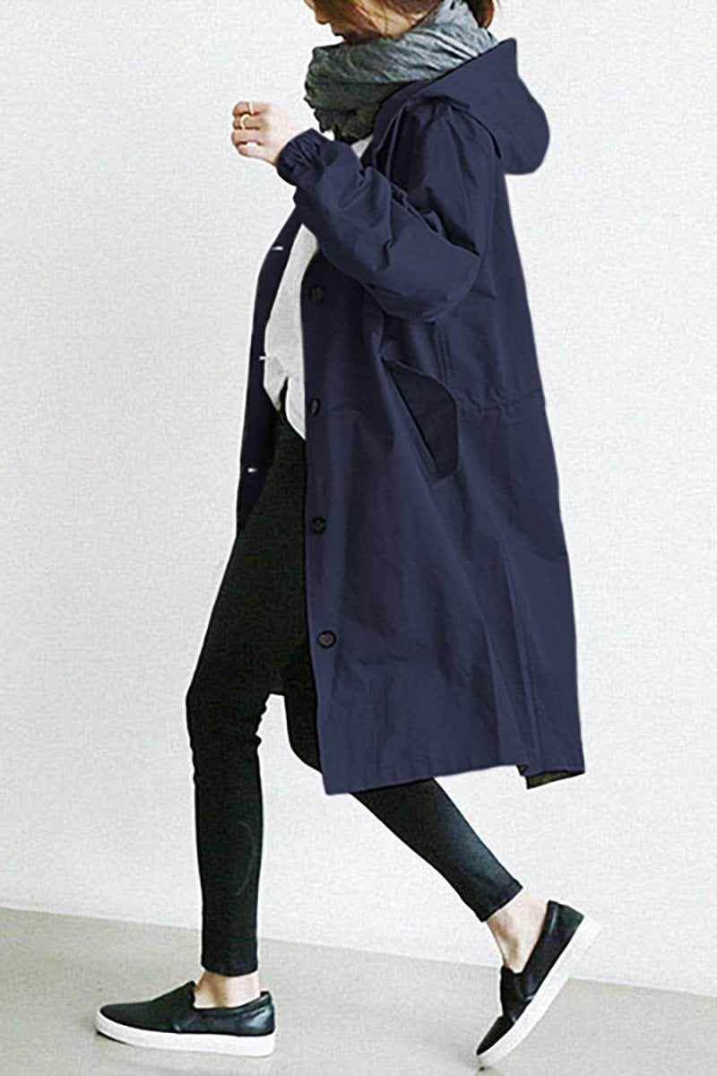 Versatile women's lightweight waterproof trench coat with hood, great for travel & everyday fall/spring wear.