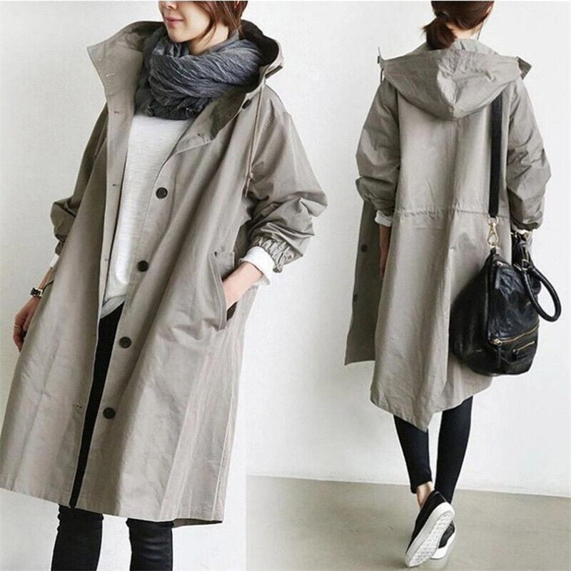 Fashionable women's lightweight waterproof trench, hooded & practical for any spring or fall rainy day.