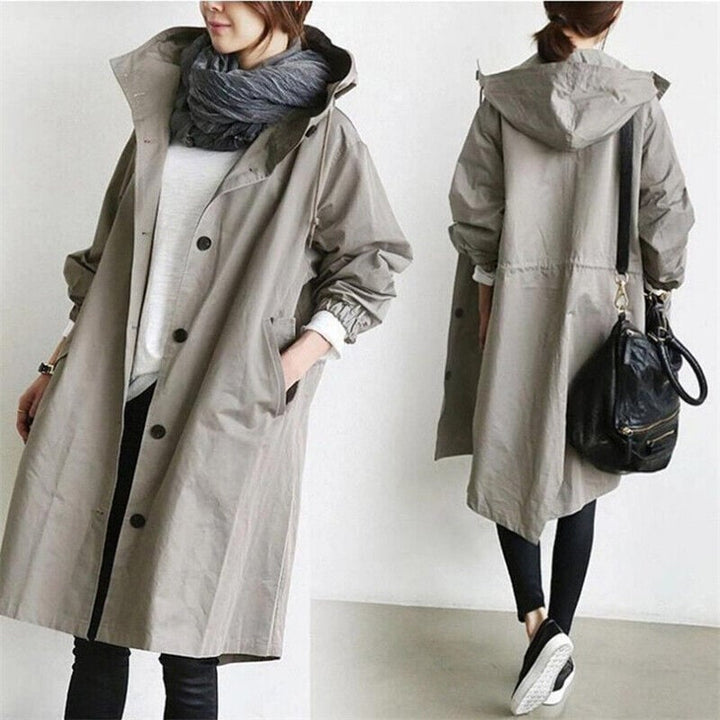Fashionable women's lightweight waterproof trench, hooded & practical for any spring or fall rainy day.