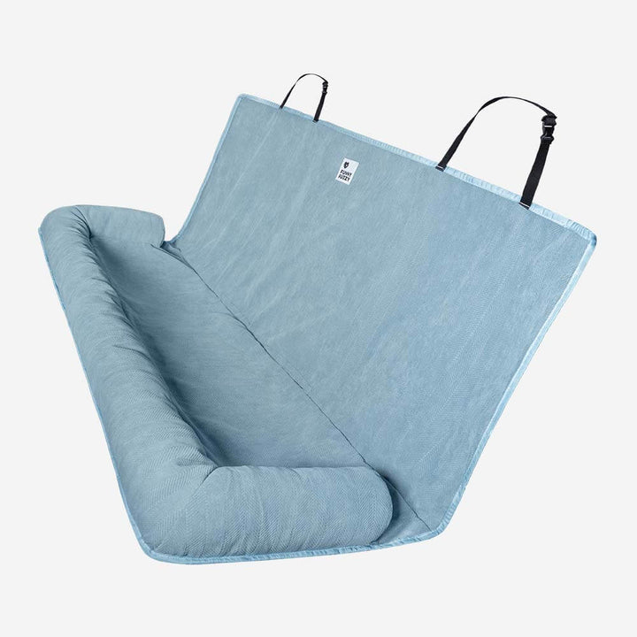 Comfortable dog car bed for safe travel, non-slip, protects vehicle upholstery.