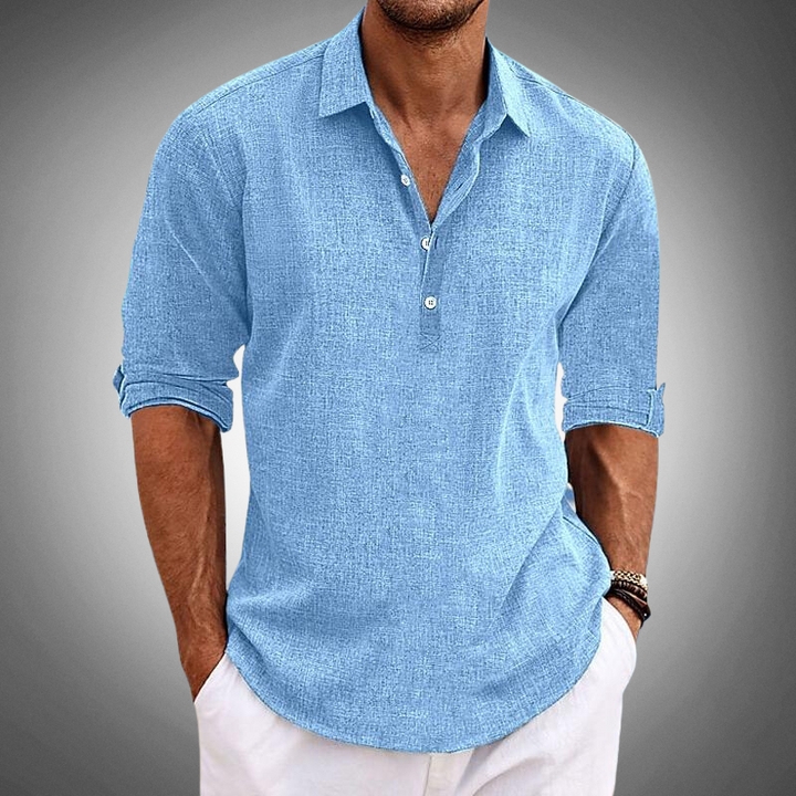 Men's blue relaxed fit button-up long sleeve shirt for casual summer wear. Versatile everyday collared shirt style.