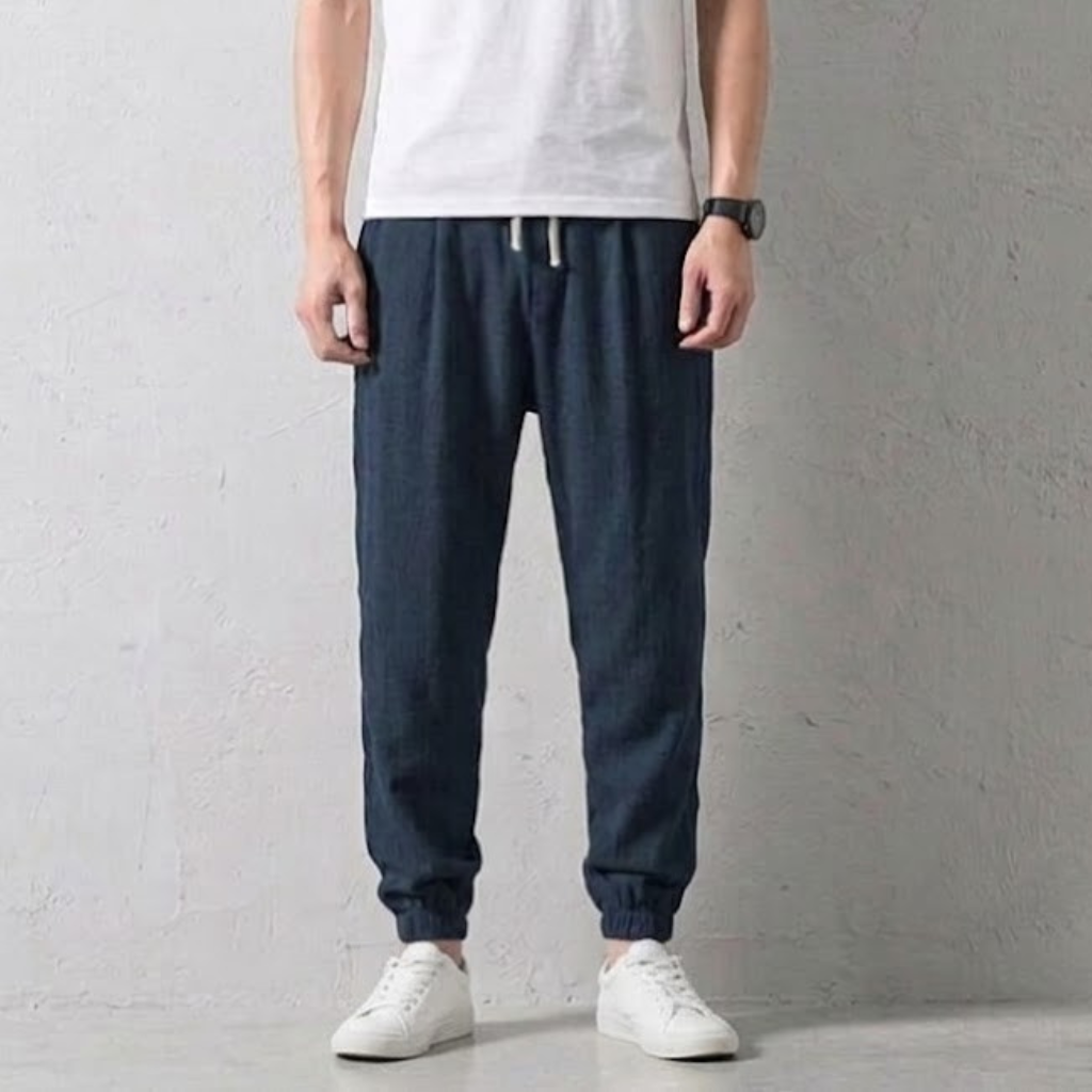 Men's tapered linen jogger pants for daily comfort, featuring a drawstring waist and elastic cuffs.