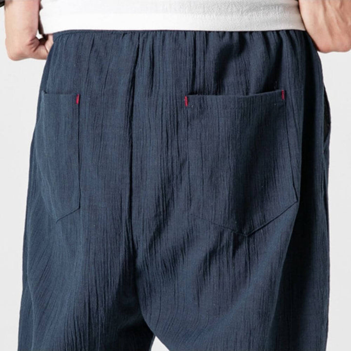 Stylish men's tapered linen joggers, perfect for casual wear. Comfortable fit for everyday activities.