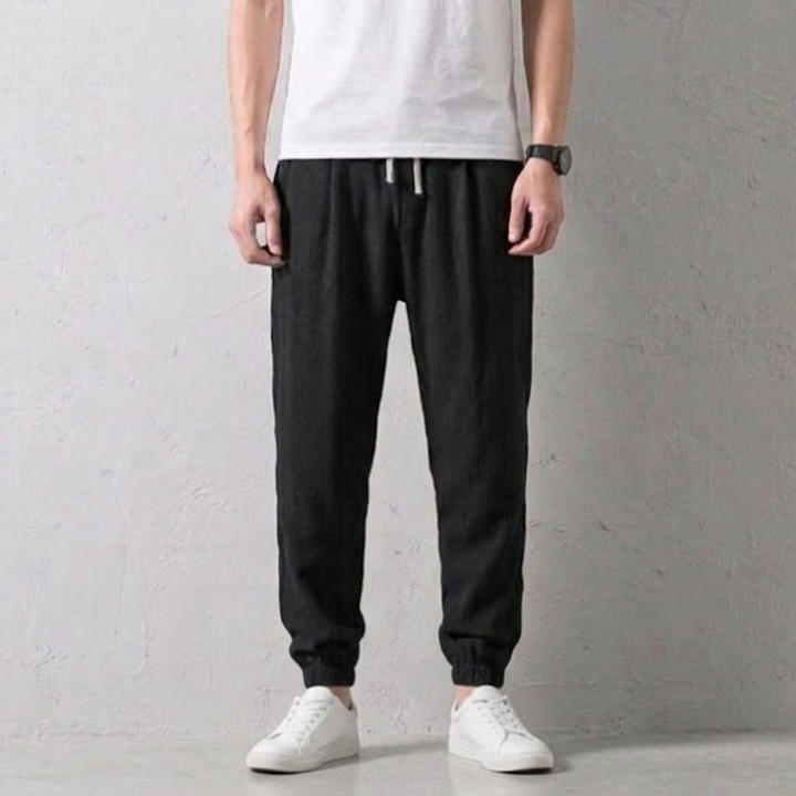 Relaxed fit men's linen jogger pants, tapered design for daily comfort and stylish casual wear.