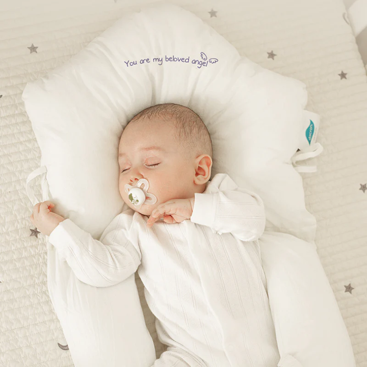 Hypoallergenic baby sleep pillow for safe infant support, promoting gentle comfort for newborns.