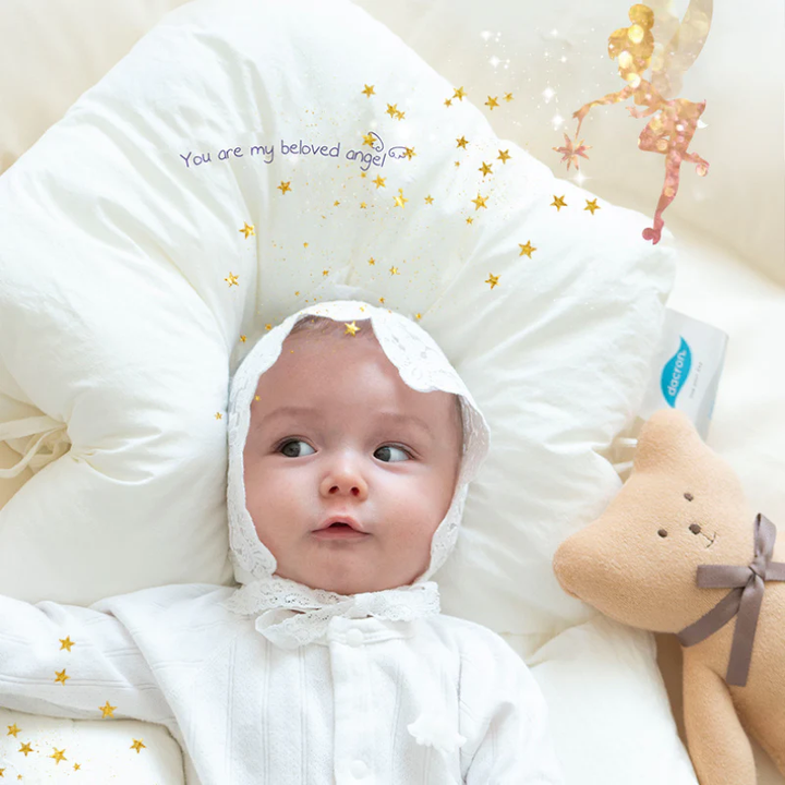 Newborn hypoallergenic sleep pillow offers safe head & neck support, a gentle comfort baby essential.