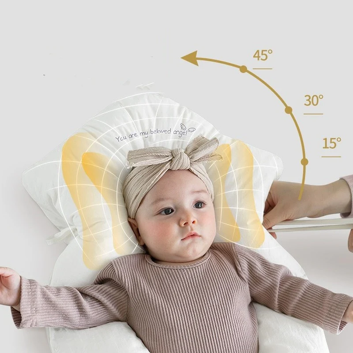 White hypoallergenic baby pillow designed for safe infant support and gentle comfort during sleep, a newborn essential.