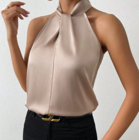 Elegant women's sleeveless twist-neck blouse in a shimmering gold, perfect for dressy office wear or evening events.