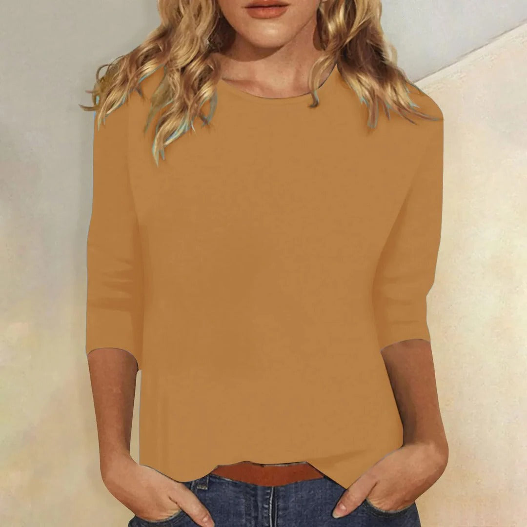 Soft women's round neck 3/4 sleeve casual top, a comfortable and versatile wardrobe essential.