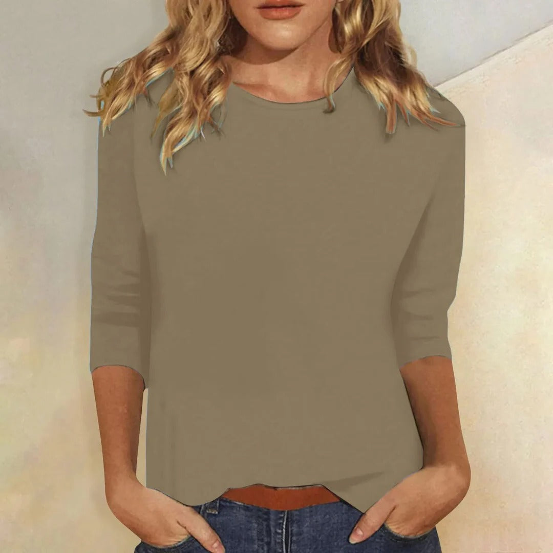 Stylish women's round neck 3/4 sleeve top, perfect for a relaxed casual everyday look.
