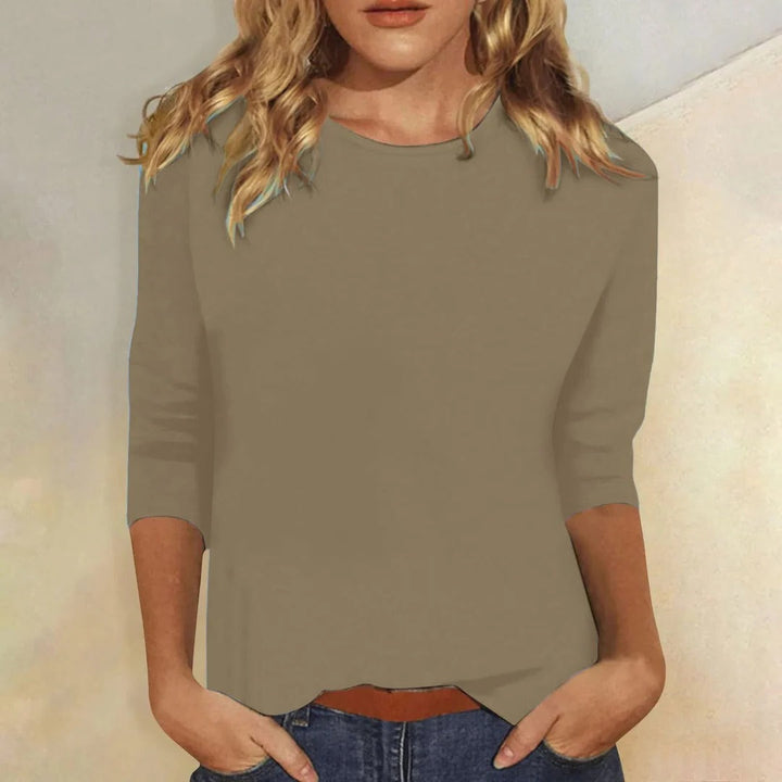 Stylish women's round neck 3/4 sleeve top, perfect for a relaxed casual everyday look.