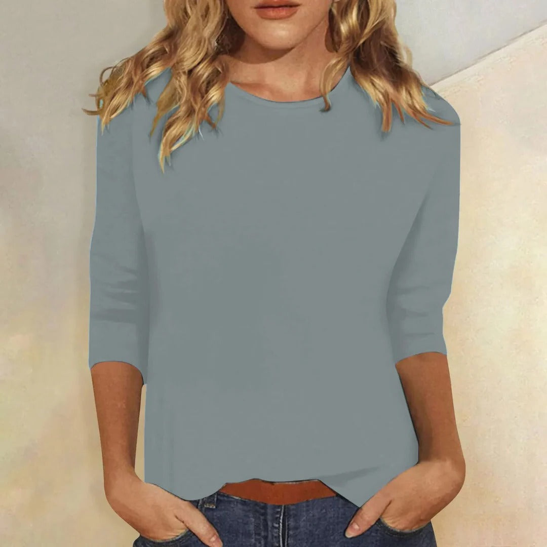 Plain women's round neck 3/4 sleeve top, a comfortable wardrobe essential for casual wear.