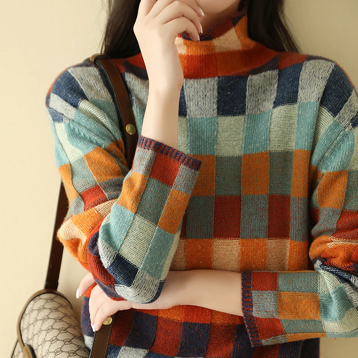 Warm women's knit pullover, designed for ultimate comfort on chilly fall & winter days.