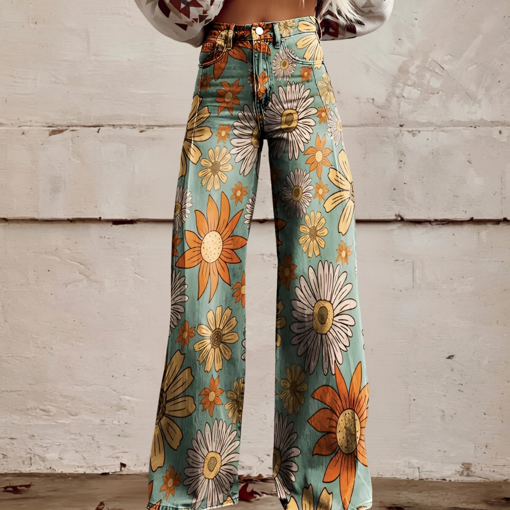 Side view of women's high waist wide leg floral jeans. Unique, comfortable, and stylish casual wear.