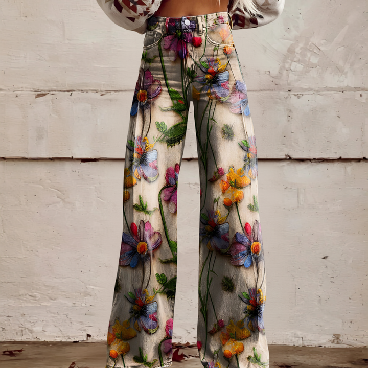 Front view of women's high waist wide leg floral jeans. Fashionable patterned denim, a true statement piece.