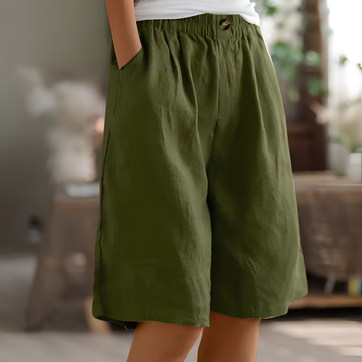 Women's loose fit shorts with elastic waist and pockets for casual comfort.