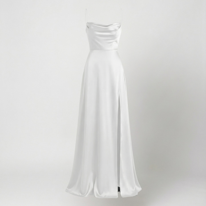 Long, elegant women's slip dress with thin straps and a high leg slit, ideal for evening parties.