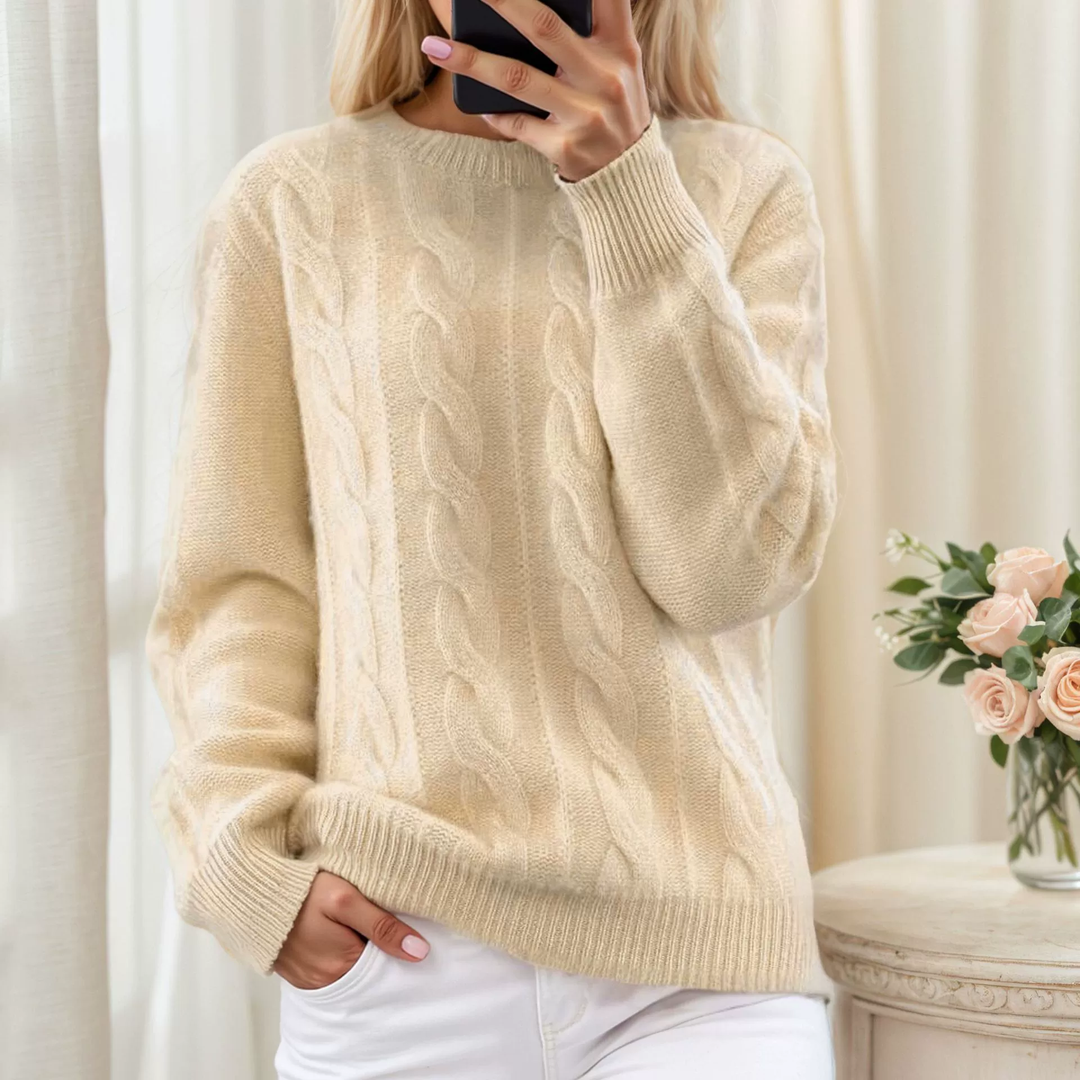 Women's cozy winter sweater in a relaxed fit, perfect for warmth and comfort on cold days.