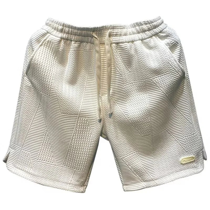 Man wearing cool herringbone summer shorts, perfect for beach or casual outings.