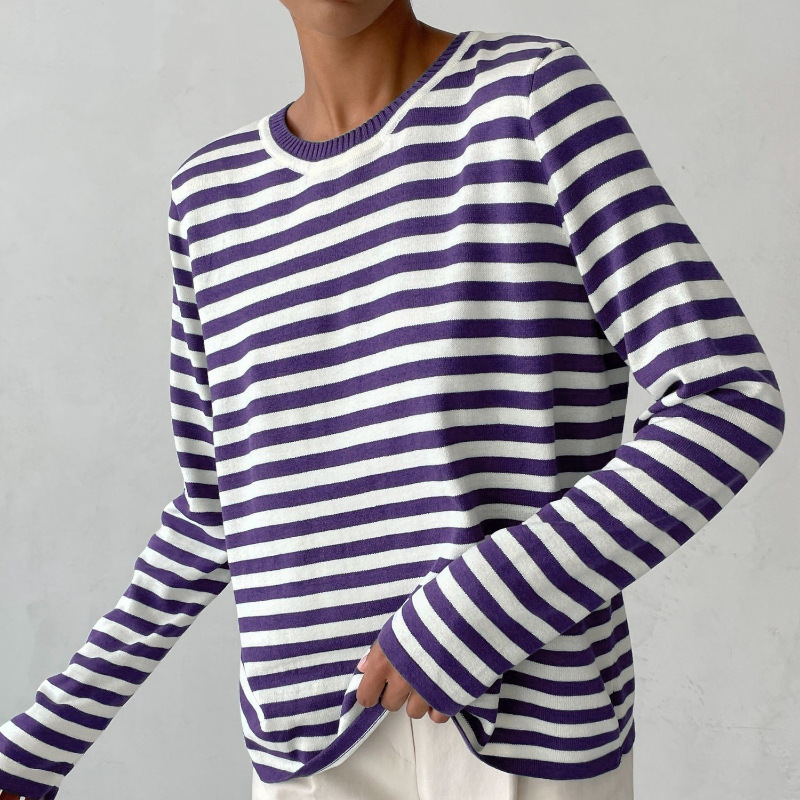 Relaxed fit women's striped knit sweater. Comfortable long sleeve crew neck pullover for everyday casual style.