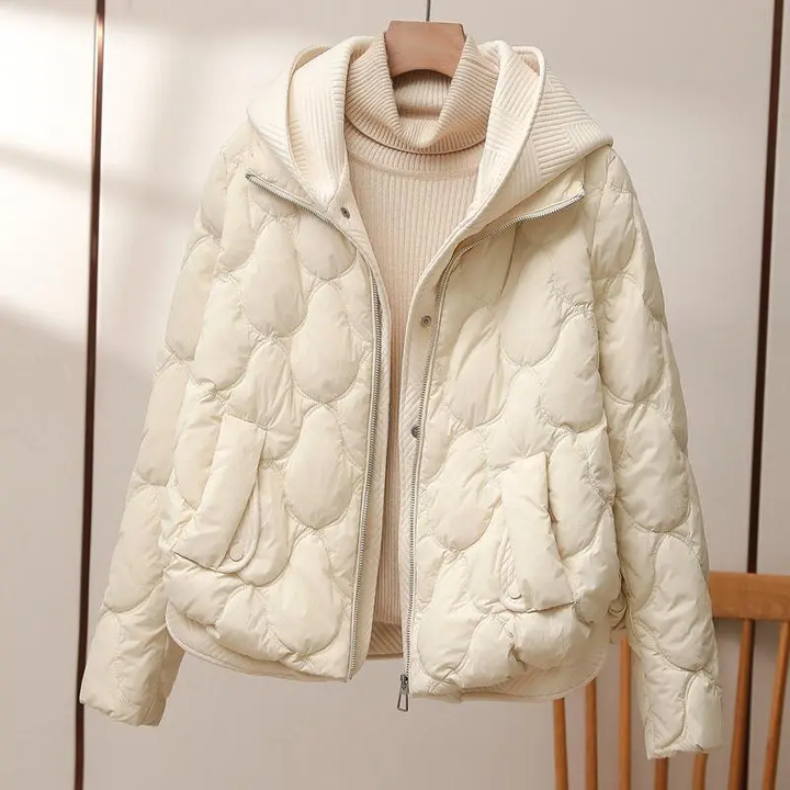 Premium Aura women's winter coat, a stylish puffer jacket offering exceptional warmth for cold weather.