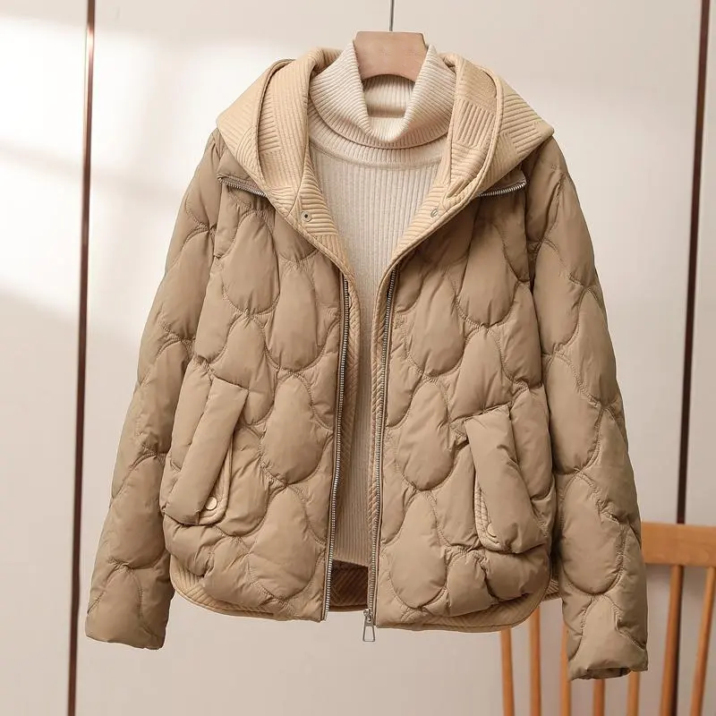 Stylish Aura women's puffer jacket, a warm winter coat for casual outerwear & cold weather.