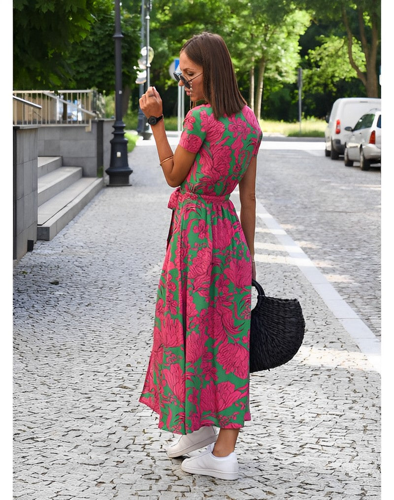 Stylish belted maxi dress for women, featuring a beautiful floral print, ideal for elegant summer fashion.