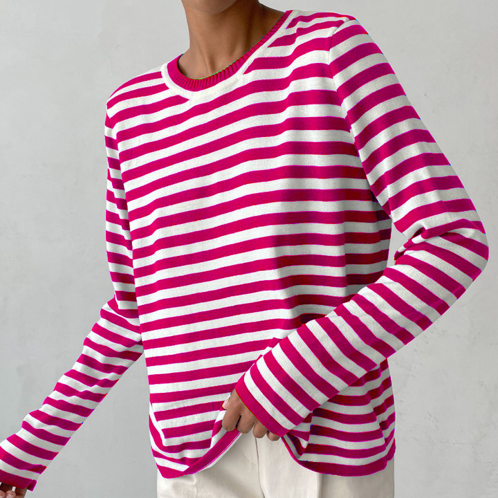 Versatile women's striped knit sweater. Long sleeve crew neck pullover, easily styled for autumn/winter outfits.