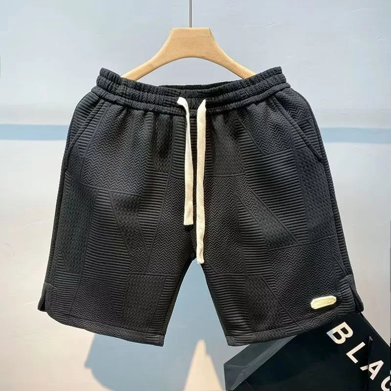 Stylish men's herringbone pattern shorts, perfect for casual summer wear.