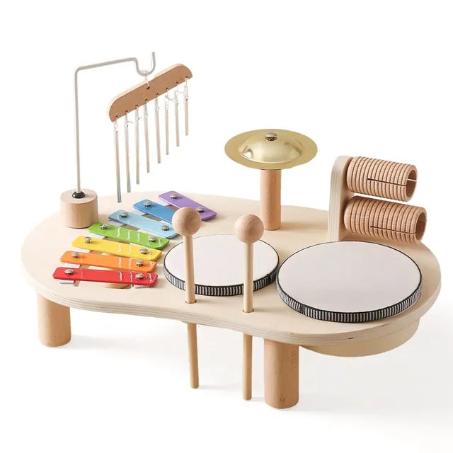 Kids' Creative Music Station toy with xylophone, drum, and bells for toddler musical development & sensory play.