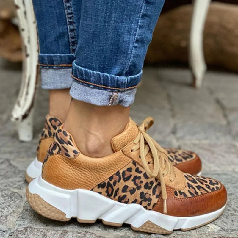 Trendy women's animal print sneakers, featuring a sleek design and ultimate comfort for everyday fashion.