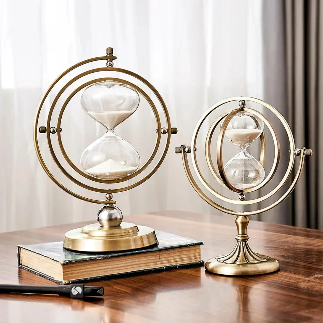 Elegant metal frame hourglass sand timer for modern home or office tabletop decor.