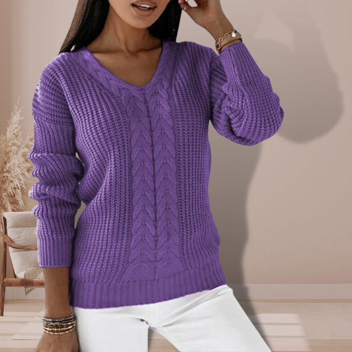 Stylish women's V-neck long sleeve sweater. A warm knit top for elegant comfort in autumn and winter.